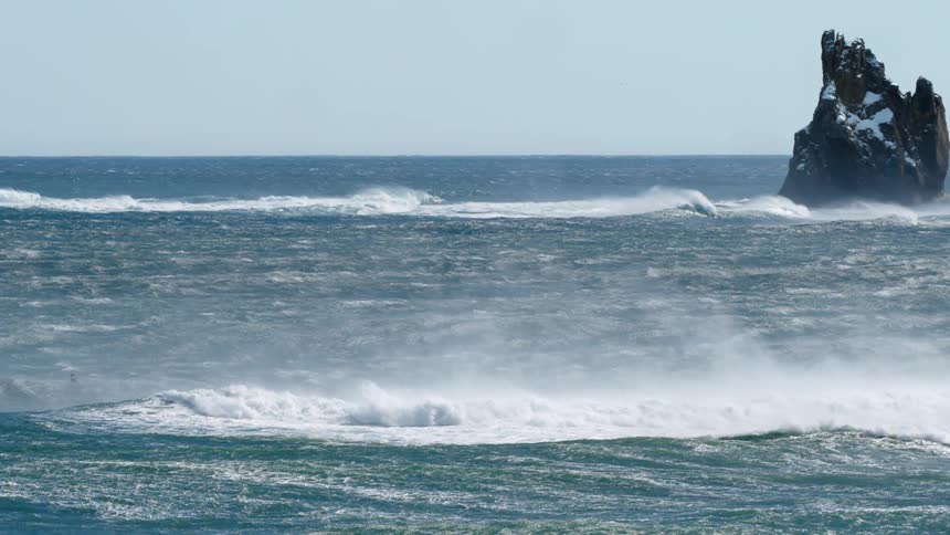 A wide shot of waves in the ocean