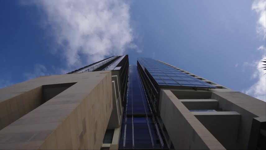 Upward view of the facade of a large modern building