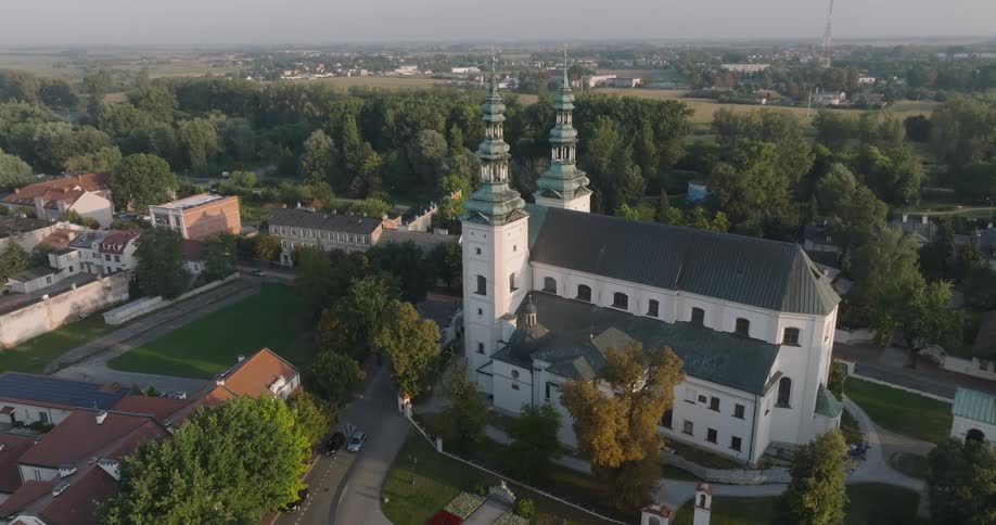 Aerial view of a church in the center of an urban city