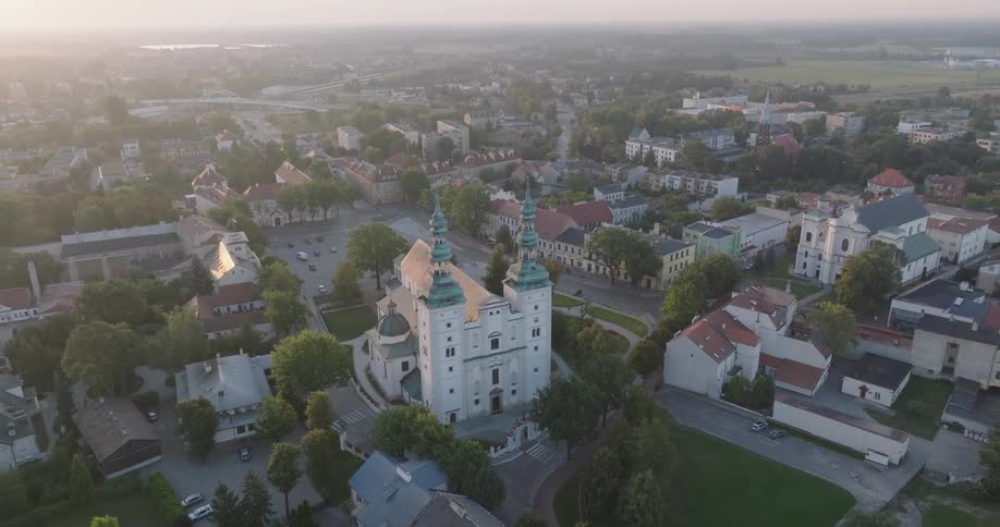 Aerial view of a church in the middle of an urban city
