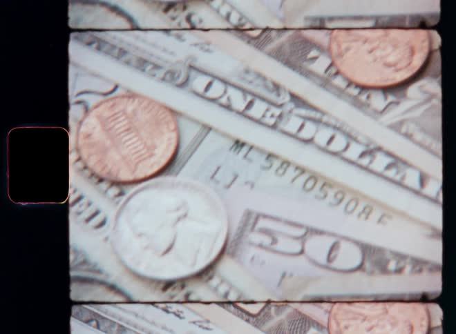 Coins are laying on the cash