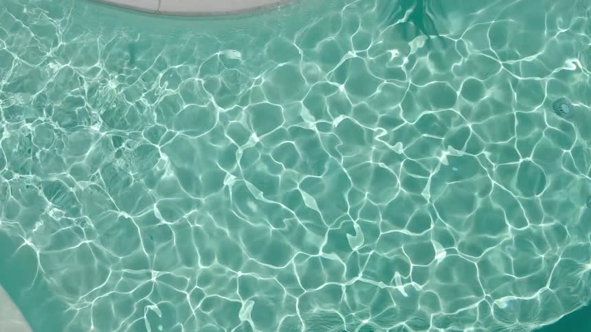 A pool with clear turquoise water