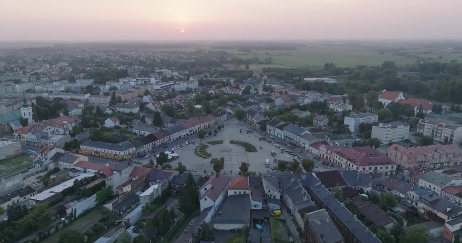 Aerial panorama of an urban city with a square in the center