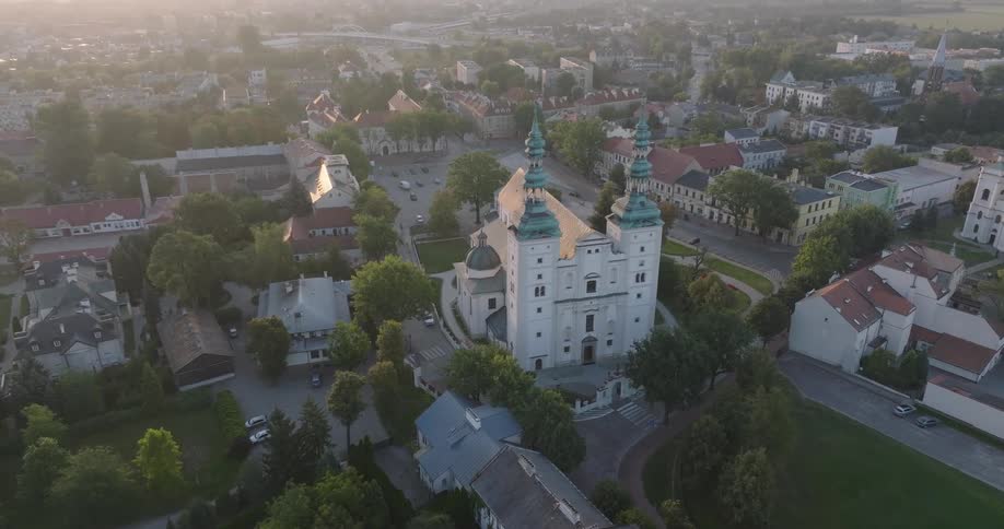 Aerial view of an urban city with a church in the center