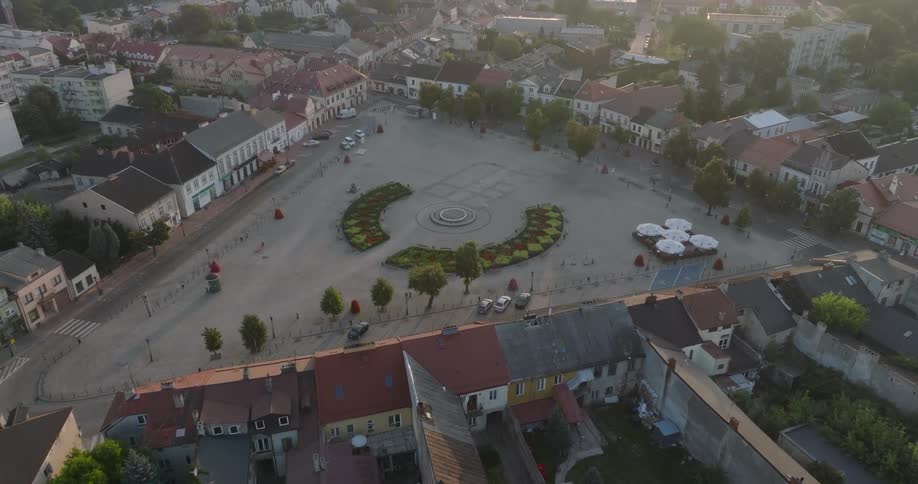 Aerial view of a public square in the center of an urban city