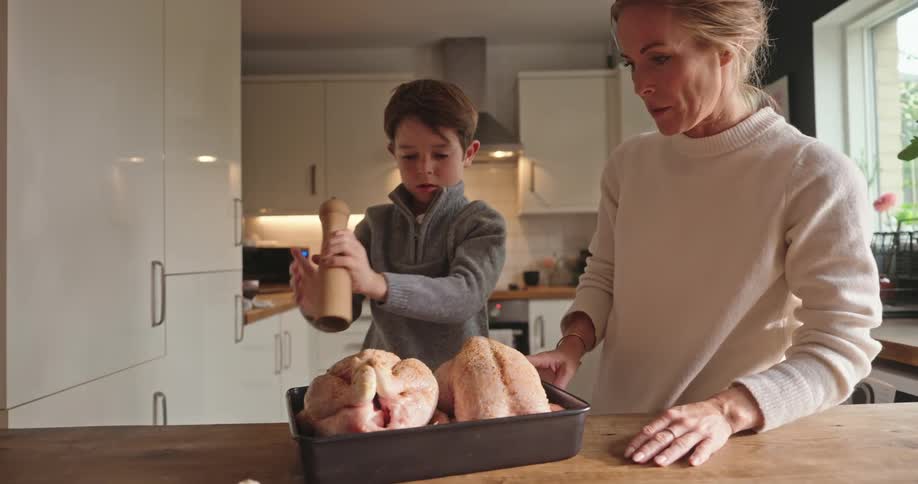 A clip of a mother and son in the kitchen