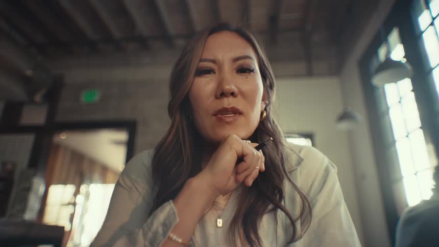 Portrait of a thoughtful woman looking at the camera