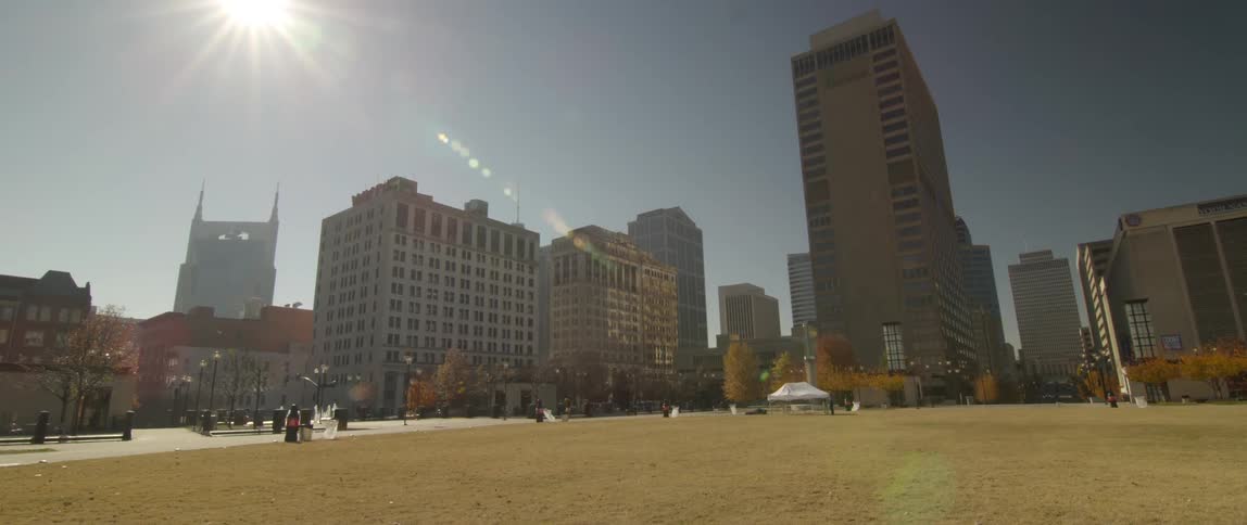 The sun shines down on a city