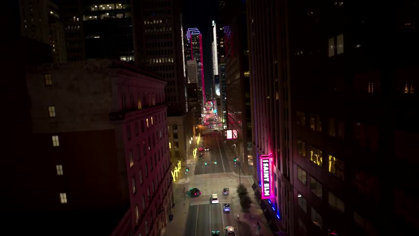 Aerial view of an intersection in a metropolis at night