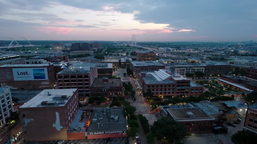 Panorama of an urban city with the sky in shades of purple and blue in the early evening