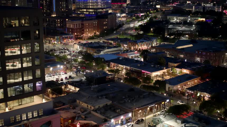 Urban area in metropolitan seen from above illuminated at night