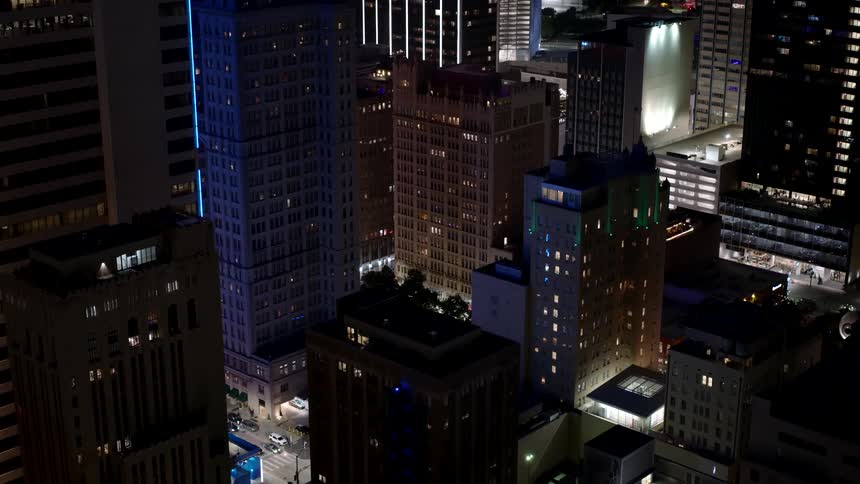 Night cityscape with illuminated buildings