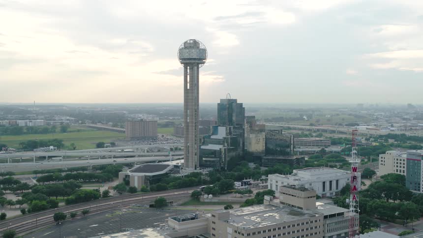 An aerial clip of a city with high rise architecture