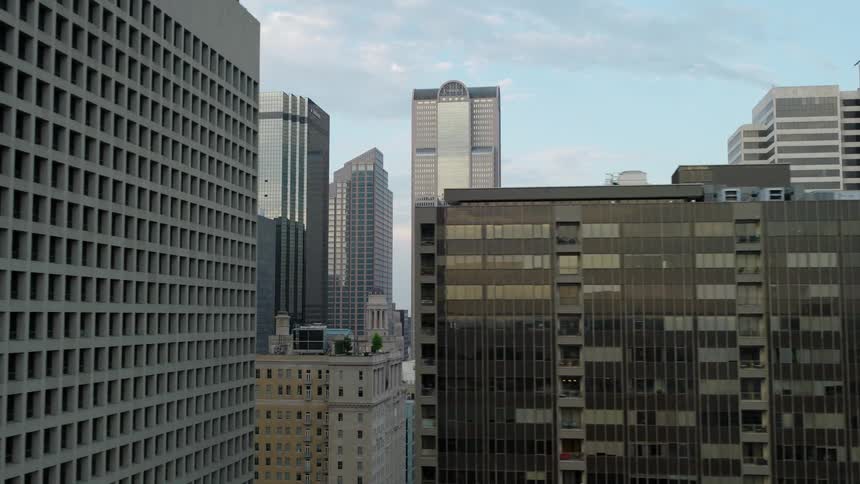 Aerial view of skyscrapers in a metropolis seen on a partly cloudy day