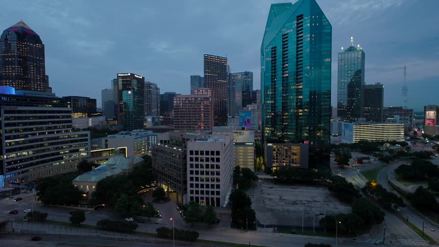 Aerial view of modern buildings in a metropolis on a partly cloudy day