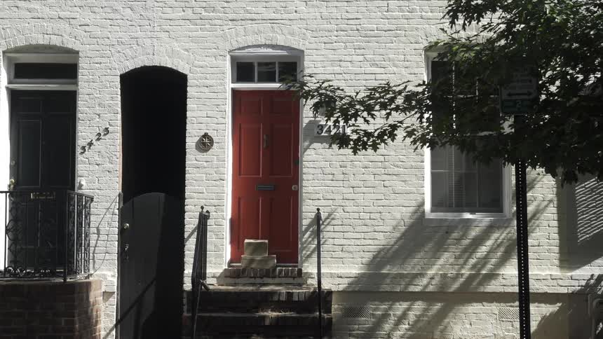A clip of a buildings entrance in a community
