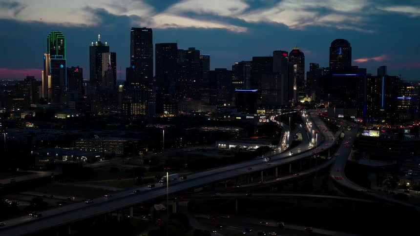 Panorama of skyscrapers and intersections in a metropolis at night