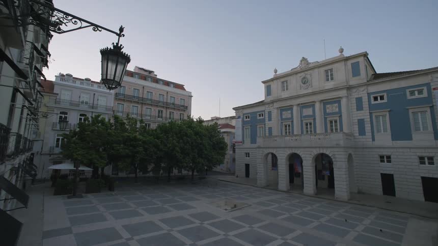 Square surrounded by classical buildings one morning