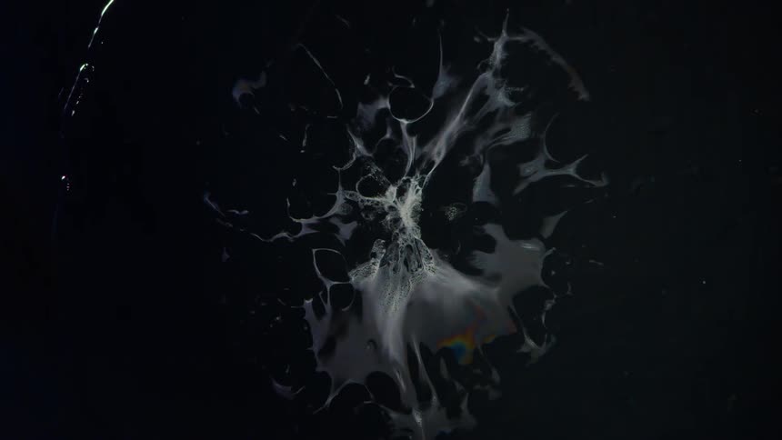 An effect where light expands into an orb and then collapses on itself