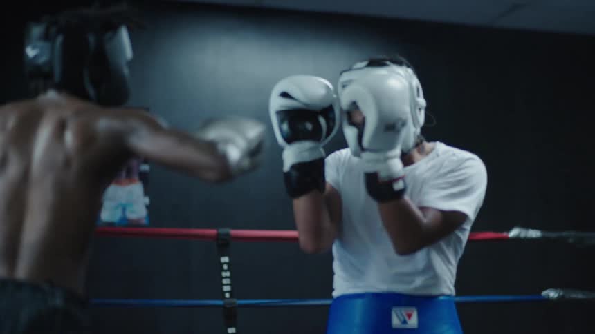 Two boxes are fighting in the ring