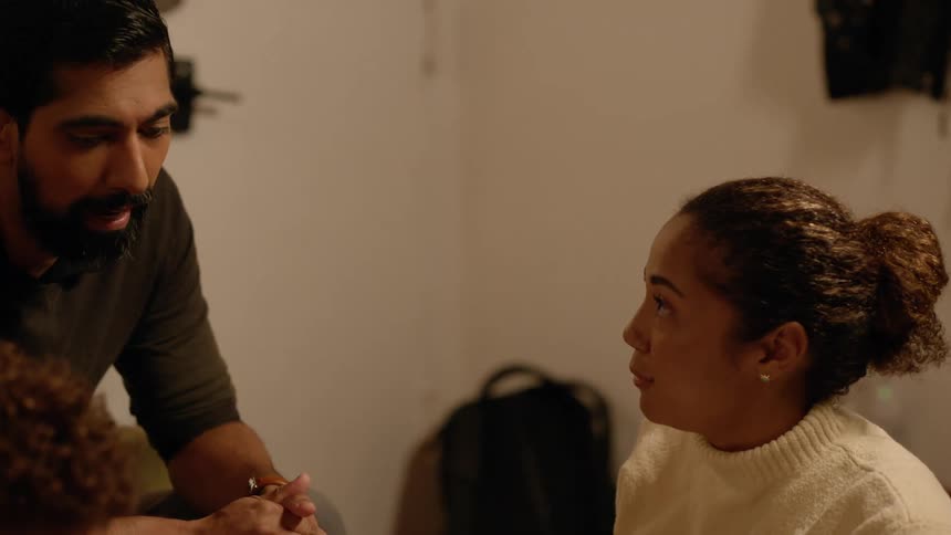 A family at home talking to each other at night