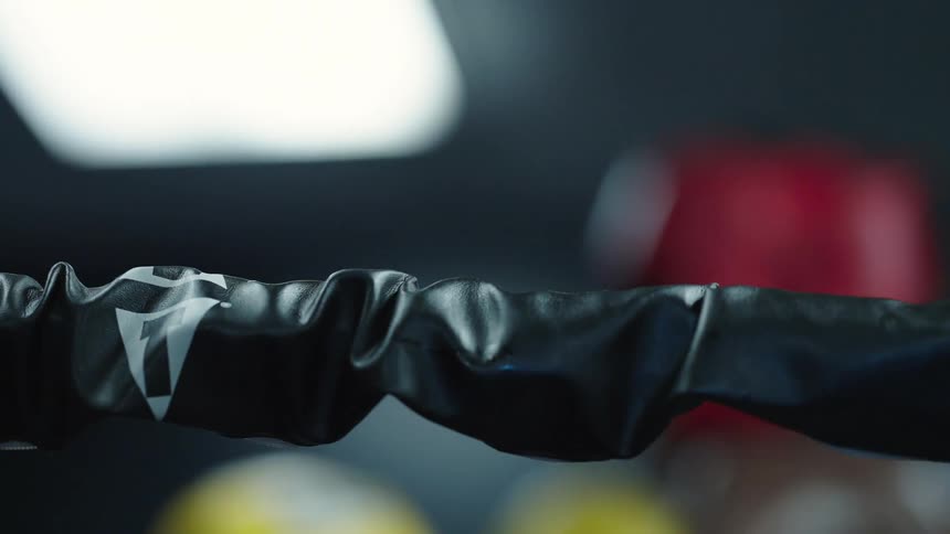 Two men are boxing in the ring