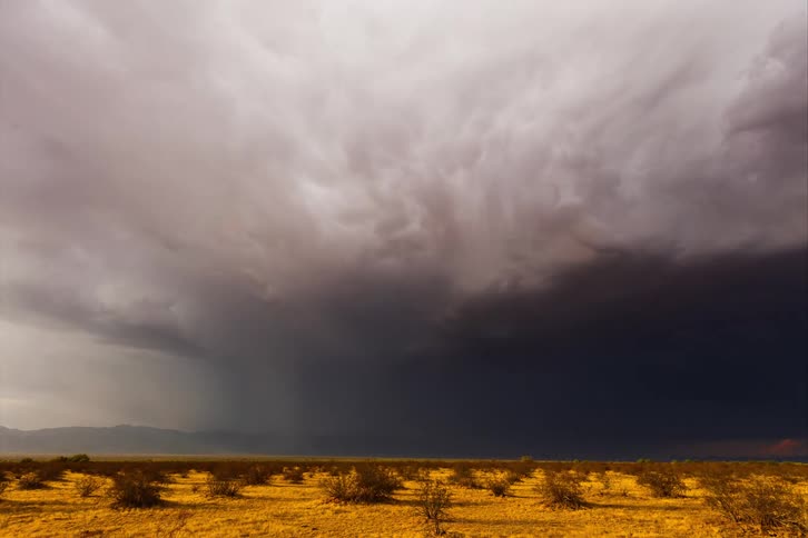 Rain pours over the landscape during the storm