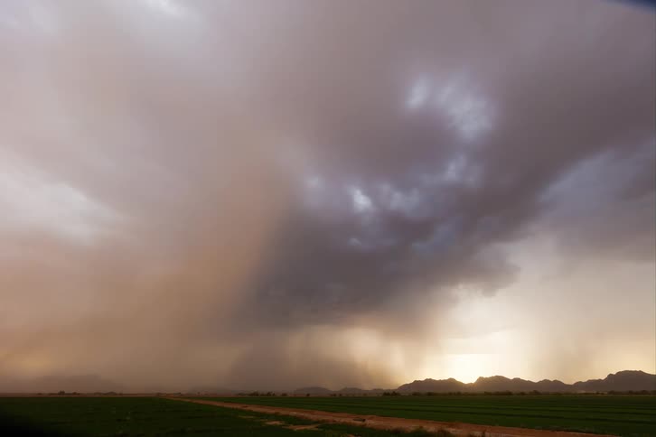 Storm front moves through the rural countryside near a country road