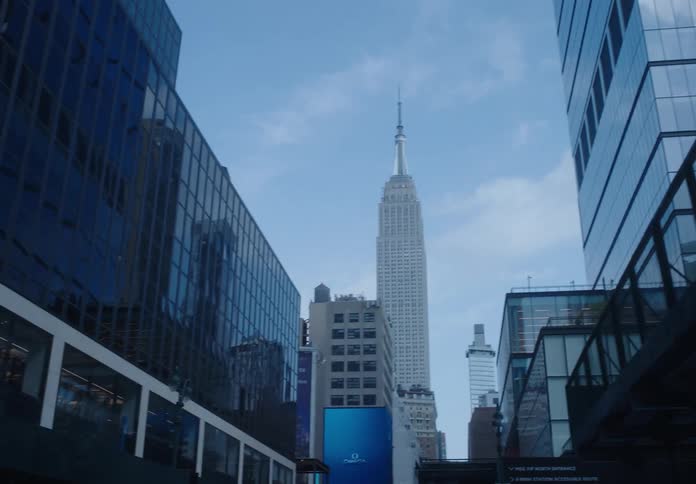 Pan to view of Empire State Building in New York City skyline