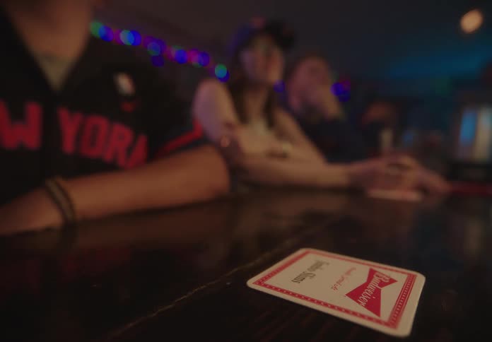 A clip of people at the bar having some drinks