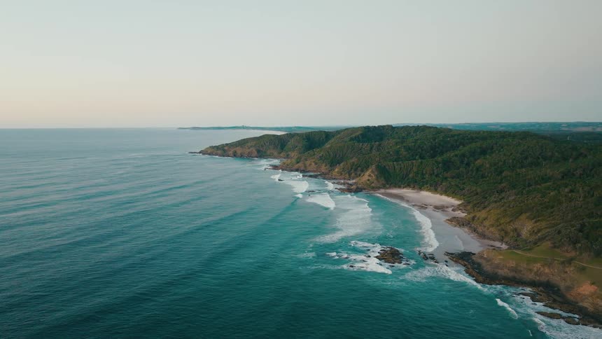Aerial view of an island with rough seas in the morning