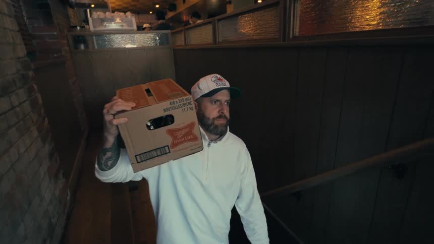 A clip of a man making a delivery