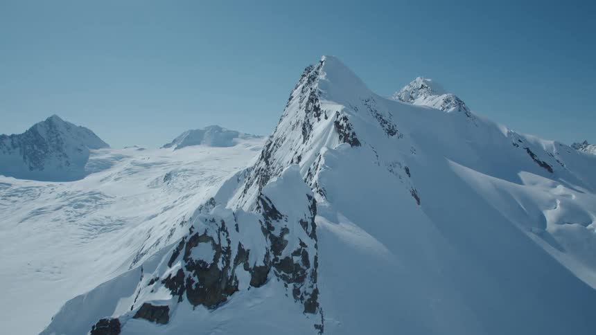 Mountains with cliffs and covered in snow