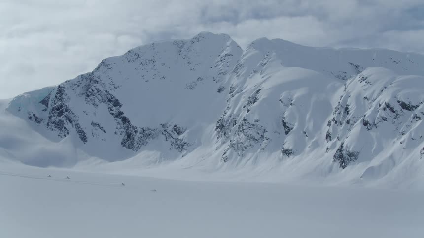 Mountainous landscape with layers of snow
