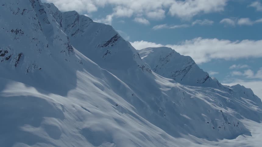 The mountain is covered with snow
