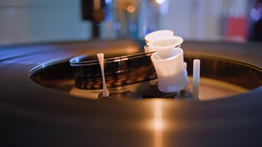 A close up clip of a rotating disk player