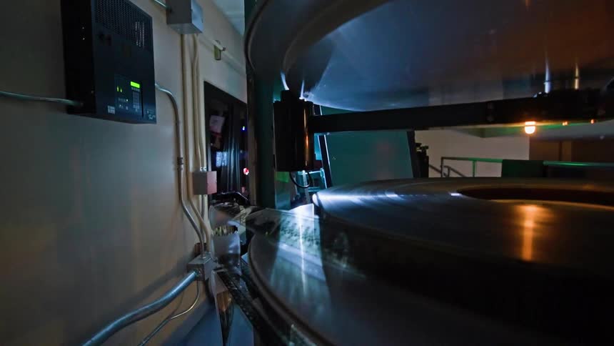 Film records and tapes in a room with vintage equipment