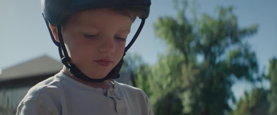 Portrait of a boy with a protective helmet