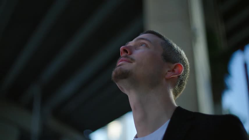 A close up clip of a man contemplating