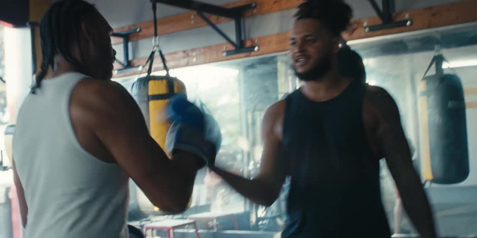 Two men training boxing and greeting each other at the end