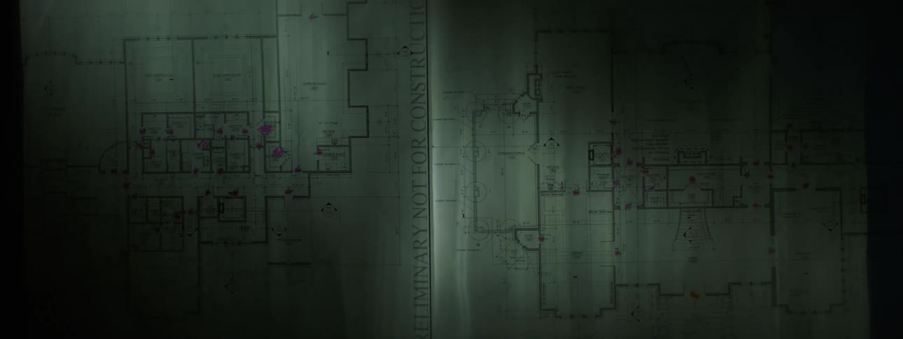 Wall with a large paper with a drawing of a project