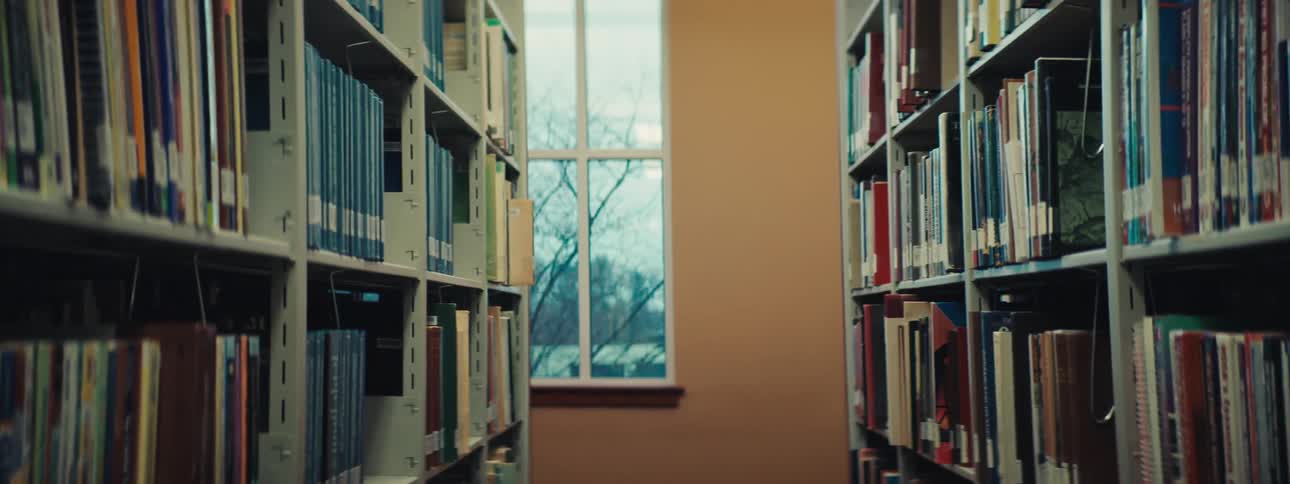 Shelves with books in a library