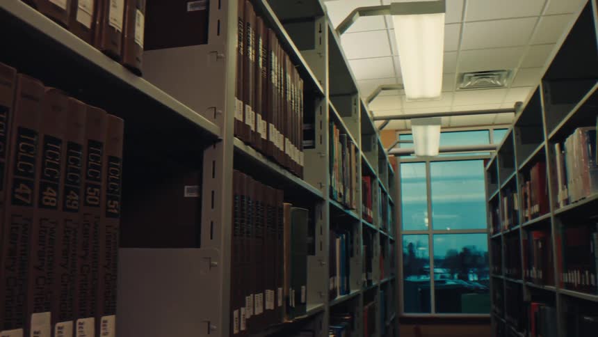 Shelves with books in a library