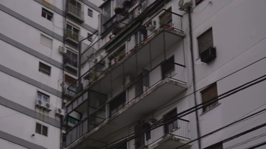 Large apartment buildings clumped together in the suburban area of a city