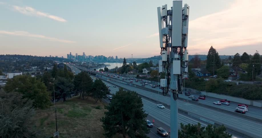 A small cell network works next to a major interstate highway near a large city