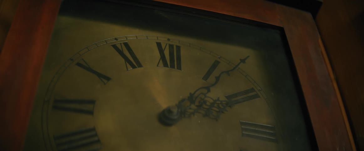 Close up of a vintage hand clock on the wall
