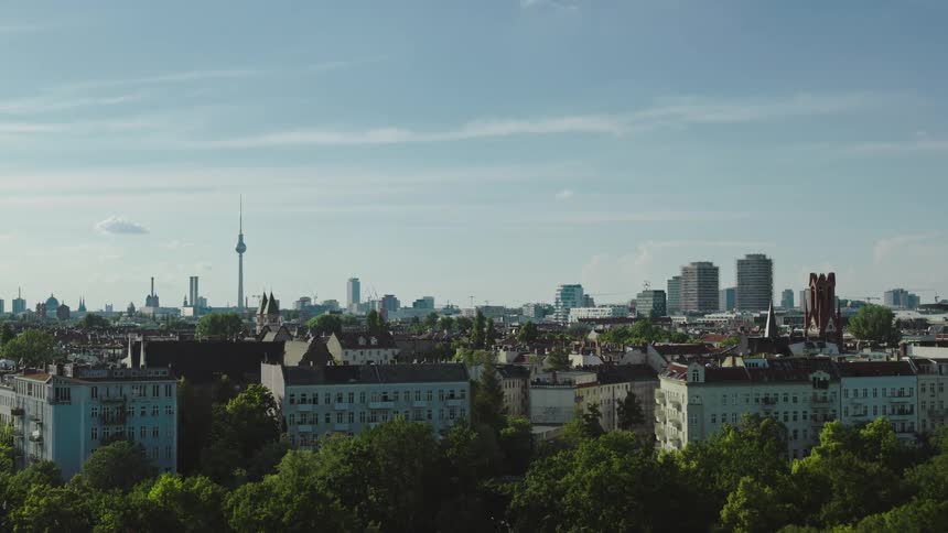 Aerial panorama of an urban area with skyscrapers of a metropolis in the background