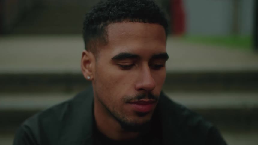 A close up clip of a black guys face