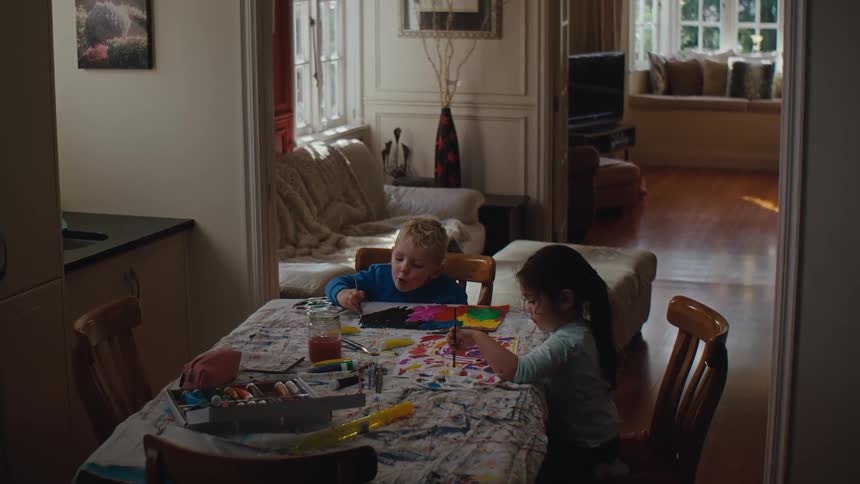 A couple kids painting