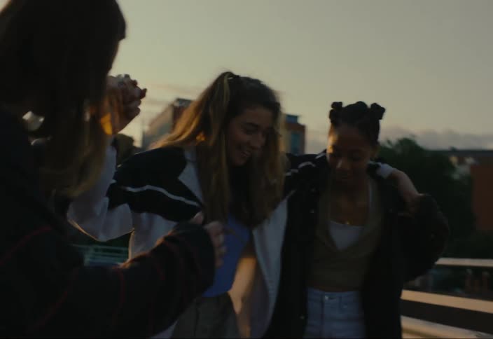 Group of friends interacting with each other in a happy way